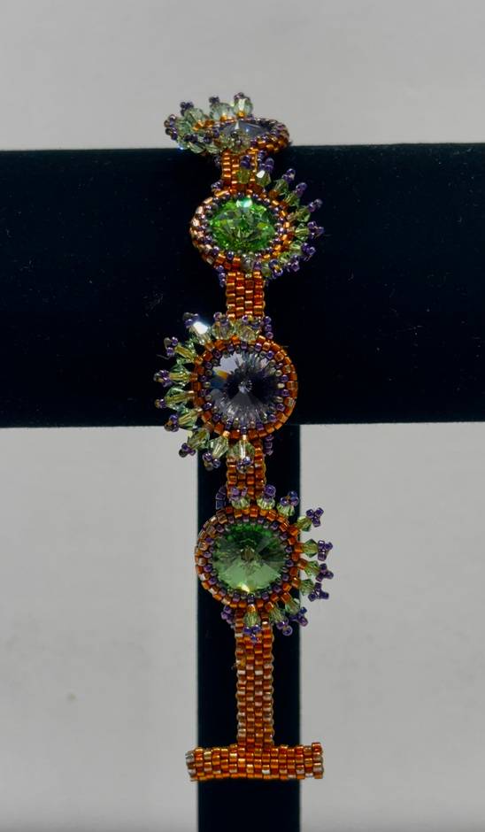 Purple and Green Swarovski Crystal and Gold Bead Asymmetrical Bracelet